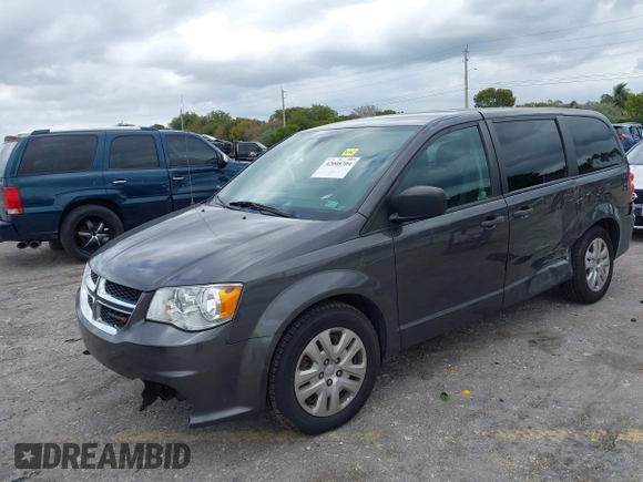 2019 Dodge Grand Caravan SE with VIN 2C4RDGBGXKR796974, listed as a IAAI auction lot 42008704 with 129,229 mi miles and . Bid and sale history available at DreamBid. Image 17.