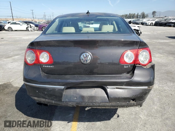 2010 Volkswagen Passat Komfort with VIN WVWJK7ANXAE129739, listed as a Copart auction lot 57798275 with 155,830 mi miles and Salvage title. Bid and sale history available at DreamBid. Image 6.