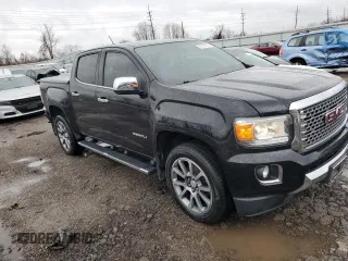 2017 GMC Canyon 4WD Denali with VIN 1GTG6EEN7H1284618, listed as a Copart auction lot 79315703 with 89,746 mi miles and Salvage Title. Bid and sale history available at carsss.com. Image 4.