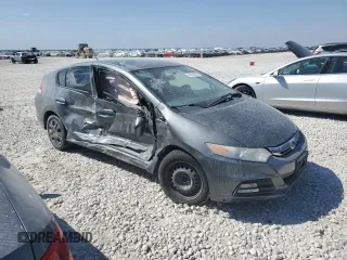 2012 Honda Insight z VIN JHMZE2H37CS002872, wystawiony jako Copart lot #48338685 z przebiegiem Nie podano mil oraz Szkoda całkowita • Salvage title. Historia ofert i sprzedaży dostępna na DreamBid. Obrazek 4.