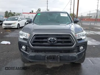 2022 Toyota Tacoma SR5 with VIN 3TMBZ5DN2NM034561, listed as a IAAI auction lot 40867443 with 51,728 mi miles and . Bid and sale history available at DreamBid. Image 12.