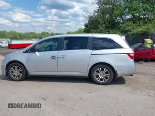 2012 Honda Odyssey EX-L with VIN 5FNRL5H67CB139701, listed as a IAAI auction lot 42233283 with 147,143 mi miles and . Bid and sale history available at DreamBid. Image 15.