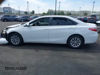 2015 Toyota Camry XLE with VIN 4T1BF1FK3FU114299, listed as a IAAI auction lot 42024946 with 152,972 mi miles. Bid and sale history available at carsss.com. Image 14.