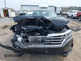 2020 Volkswagen Passat 2.0T SE with VIN 1VWWA7A30LC013193, listed as a IAAI auction lot 42127722 with 55,963 mi miles. Bid and sale history available at carsss.com. Image 12.
