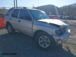 2001 Isuzu Rodeo S with VIN 4S2DM58W414351245, listed as a IAAI auction lot 41339632 with 149,543 mi miles. Bid and sale history available at carsss.com. Image 1.