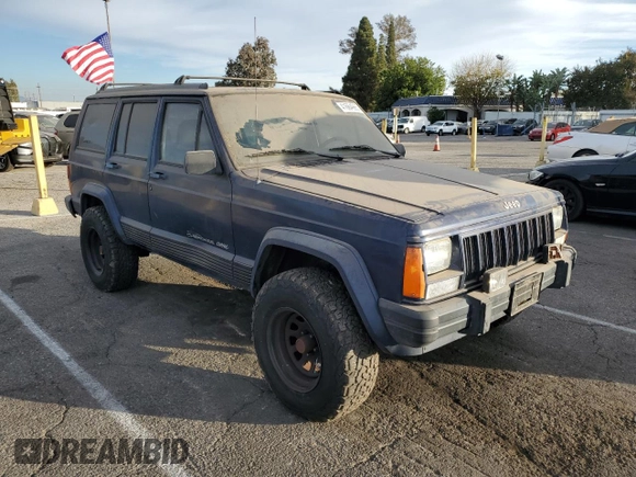 1996 Jeep Cherokee Sport with VIN 1J4FT68S4TL333342, listed as a Copart auction lot 41664965 with 185,199 mi miles and Clean Title. Bid and sale history available at carsss.com. Image 4.