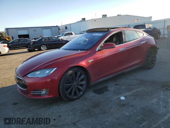 2015 Tesla Model S 85D with VIN 5YJSA1E40FF114095, listed as a Copart auction lot 84114284 with 114,882 mi miles and Salvage Title. Bid and sale history available at carsss.com. Image 1.