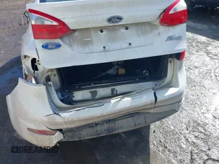 2014 Ford Fiesta S z VIN 3FADP4AJ4EM125475, wystawiony jako IAAI lot #41697578 z przebiegiem 160 189 mil mil oraz . Historia ofert i sprzedaży dostępna na DreamBid. Obrazek 6.