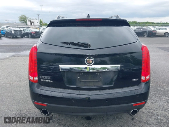 2015 Cadillac SRX Luxury Collection z VIN 3GYFNEE34FS510360, wystawiony jako IAAI lot #42343737 z przebiegiem 149 046 mil mil oraz . Historia ofert i sprzedaży dostępna na DreamBid. Obrazek 16.