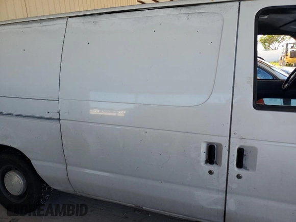 2002 Ford Econoline Cargo with VIN 1FTRE14292HB60778, listed as a Copart auction lot 74345234 with 173,366 mi miles and Salvage Title. Bid and sale history available at DreamBid. Image 11.
