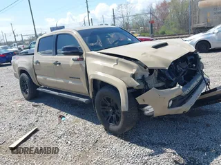2020 Toyota Tacoma SR5 z VIN 3TMCZ5AN1LM300447, wystawiony jako IAAI lot #41961434 z przebiegiem 42 090 mil mil oraz . Historia ofert i sprzedaży dostępna na DreamBid. Obrazek 1.