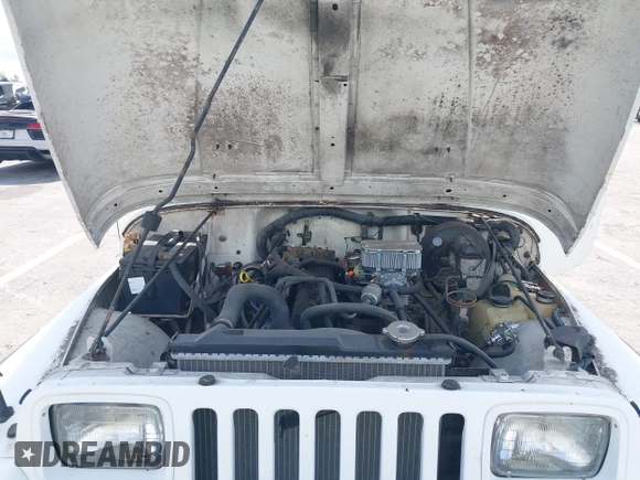 1990 Jeep Wrangler with VIN 2J4FY29T7LJ528844, listed as a IAAI auction lot 42354175 with 69,349 mi miles and . Bid and sale history available at DreamBid. Image 10.