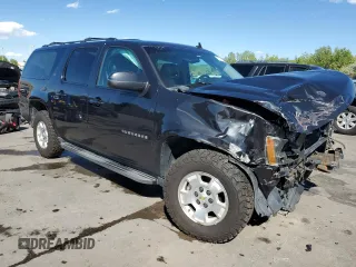2013 Chevrolet Suburban LT with VIN 1GNSKJE70DR138631, listed as a Copart auction lot 57778185 with 176,934 mi miles and Salvage title. Bid and sale history available at DreamBid. Image 4.