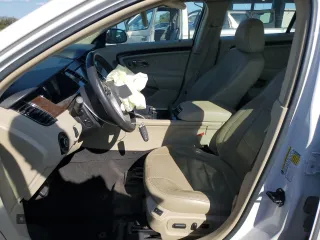 2015 Ford Taurus Limited z VIN 1FAHP2J8XFG123759, wystawiony jako Copart lot #50548205 z przebiegiem 128 266 mil mil oraz Szkoda całkowita • Salvage title. Historia ofert i sprzedaży dostępna na DreamBid. Obrazek 7.