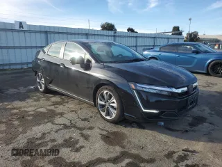 2018 Honda Clarity Plug-In Hybrid with VIN JHMZC5F1XJC022159, listed as a Copart auction lot 87274624 with 58,680 mi miles and Salvage Title. Bid and sale history available at carsss.com. Image 4.