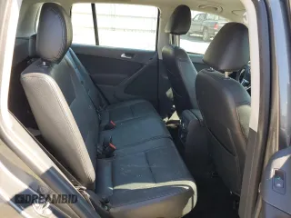 2014 Volkswagen Tiguan SE with VIN WVGAV3AX8EW619044, listed as a Copart auction lot 46990185 with 171,972 mi miles and Salvage title. Bid and sale history available at DreamBid. Image 11.