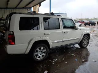 2010 Jeep Commander Limited with VIN 1J4RG5GT0AC137563, listed as a Copart auction lot 54178235 with 146,196 mi miles and Salvage title. Bid and sale history available at DreamBid. Image 3.