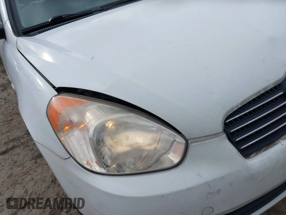 2007 Hyundai Accent GLS with VIN KMHCN46C67U097159, listed as a IAAI auction lot 41913373 with 103,303 mi miles. Bid and sale history available at carsss.com. Image 6.
