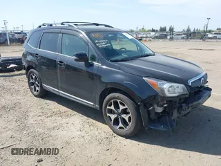 2015 Subaru Forester XT Touring with VIN JF2SJGUC5FH822632, listed as a IAAI auction lot 42032965 with 118,111 mi miles and . Bid and sale history available at DreamBid. Image 1.