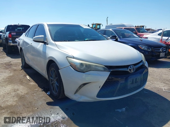 2015 Toyota Camry XLE with VIN 4T1BF1FK5FU114661, listed as a IAAI auction lot 41633878 with 124,013 mi miles and . Bid and sale history available at DreamBid. Image 1.