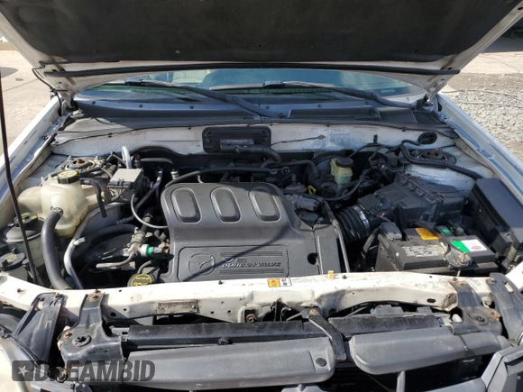 2003 Mazda Tribute LX with VIN 4F2CZ94133KM19916, listed as a Copart auction lot 73718284 with 151,644 mi miles and Salvage Title. Bid and sale history available at DreamBid. Image 12.