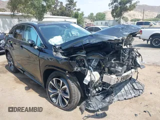 2020 Lexus RX 450h z VIN 2T2HGMDA5LC052075, wystawiony jako IAAI lot #42407001 z przebiegiem 105 686 mil mil oraz . Historia ofert i sprzedaży dostępna na DreamBid. Obrazek 1.