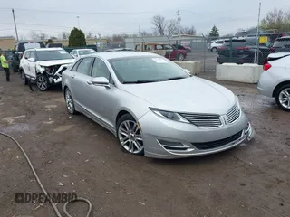 2013 Lincoln MKZ z VIN 3LN6L2GK0DR823324, wystawiony jako IAAI lot #41954237 z przebiegiem 135 077 mil mil oraz . Historia ofert i sprzedaży dostępna na DreamBid. Obrazek 1.