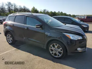 2015 Ford Escape Titanium with VIN 1FMCU0J95FUB59026, listed as a Copart auction lot 65047545 with 84,259 mi miles and Salvage title. Bid and sale history available at DreamBid. Image 4.