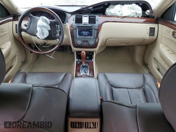 2007 Cadillac DTS Performance z VIN 1G6KD57907U171271, wystawiony jako Copart lot #79007574 z przebiegiem 147 504 mil mil oraz Szkoda całkowita • Salvage title. Historia ofert i sprzedaży dostępna na DreamBid. Obrazek 8.