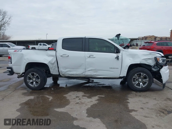2019 Chevrolet Colorado 4WD Z71 z VIN 1GCGTDEN3K1317883, wystawiony jako IAAI lot #41439010 z przebiegiem 34 306 mil mil oraz . Historia ofert i sprzedaży dostępna na DreamBid. Obrazek 14.