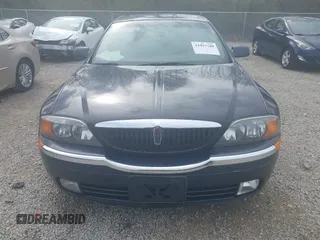 2000 Lincoln LS with VIN 1LNHM87A6YY879355, listed as a IAAI auction lot 41917760 with 70,457 mi miles. Bid and sale history available at carsss.com. Image 12.