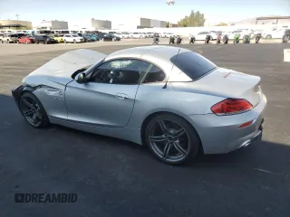 2011 BMW Z4 sDrive35is with VIN WBALM1C54BE633439, listed as a Copart auction lot 60327265 with 112,302 mi miles and Salvage title. Bid and sale history available at DreamBid. Image 2.