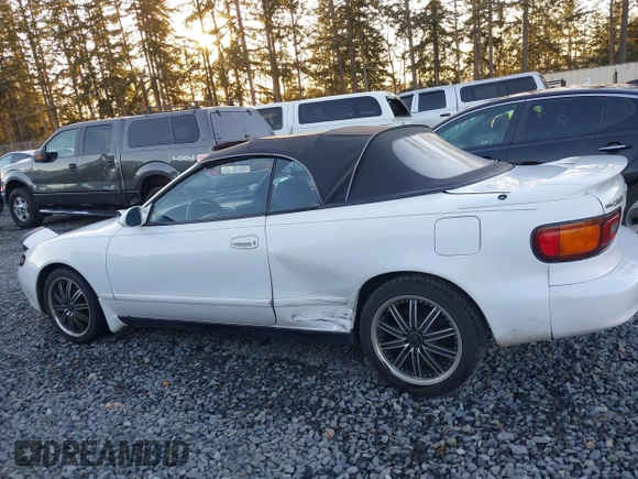 1993 Toyota Celica z VIN JT5ST87K6P0145748, wystawiony jako IAAI lot #41401540 z przebiegiem 165 469 mil mil oraz . Historia ofert i sprzedaży dostępna na DreamBid. Obrazek 14.