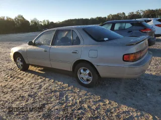 1992 Toyota Camry LE with VIN 4T1SK12E1NU127255, listed as a Copart auction lot 75554584 with 385,507 mi miles and Salvage Title. Bid and sale history available at carsss.com. Image 2.