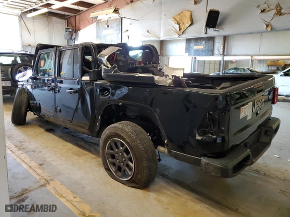 2023 Jeep Gladiator Overland with VIN 1C6HJTFG3PL514611, listed as a Copart auction lot 39195344 with 0 mi miles and Salvage Title. Bid and sale history available at carsss.com. Image 2.