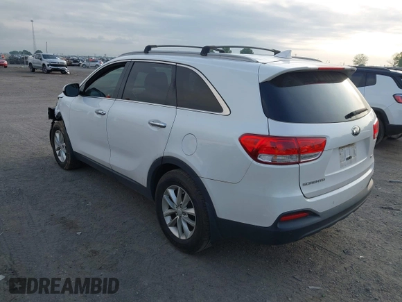 2017 Kia Sorento LX with VIN 5XYPG4A35HG205801, listed as a IAAI auction lot 42143064 with 129,647 mi miles. Bid and sale history available at carsss.com. Image 3.