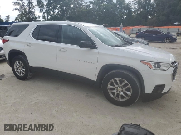 2018 Chevrolet Traverse LS with VIN 1GNERFKW7JJ217709, listed as a Copart auction lot 63332405 with 127,758 mi miles and Salvage title. Bid and sale history available at DreamBid. Image 4.