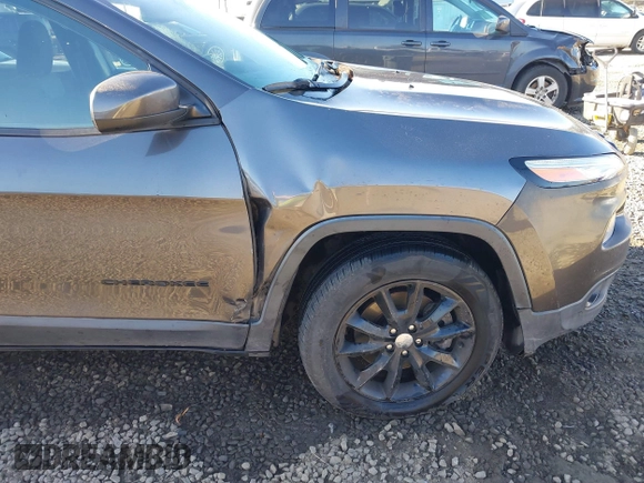 2014 Jeep Cherokee Latitude with VIN 1C4PJMCB5EW294631, listed as a IAAI auction lot 41453628 with 127,847 mi miles and . Bid and sale history available at DreamBid. Image 6.