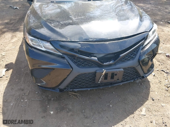 2018 Toyota Camry LE with VIN 4T1B11HK9JU115557, listed as a IAAI auction lot 42087452 with 185,752 mi miles. Bid and sale history available at carsss.com. Image 6.