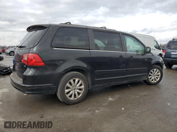 2014 Volkswagen Routan SE with VIN 2C4RVABG5ER135304, listed as a Copart auction lot 83957644 with 118,035 mi miles and Clean title. Bid and sale history available at DreamBid. Image 3.