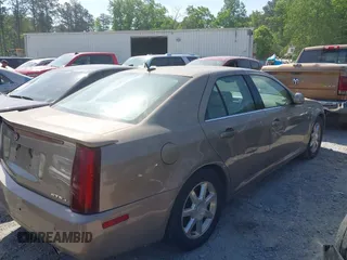 2007 Cadillac STS z VIN 1G6DW677X70117510, wystawiony jako IAAI lot #42061512 z przebiegiem 187 798 mil mil oraz . Historia ofert i sprzedaży dostępna na DreamBid. Obrazek 4.