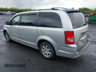 2010 Chrysler Town & Country Touring with VIN 2A4RR5D18AR151604, listed as a IAAI auction lot 42208309 with 207,886 mi miles and . Bid and sale history available at DreamBid. Image 3.