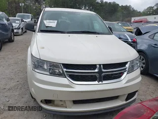 2014 Dodge Journey SE with VIN 3C4PDCABXET135338, listed as a IAAI auction lot 41950088 with 209,944 mi miles. Bid and sale history available at carsss.com. Image 12.
