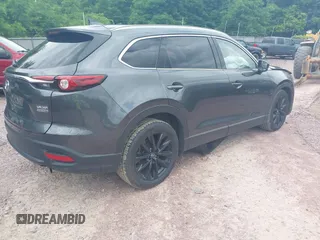 2022 Mazda CX-9 Touring Plus with VIN JM3TCBAY2N0611876, listed as a IAAI auction lot 42369073 with 37,639 mi miles and . Bid and sale history available at DreamBid. Image 4.