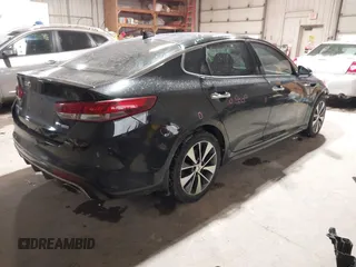 2016 Kia Optima SX Turbo with VIN 5XXGW4L27GG106780, listed as a IAAI auction lot 41586007 with 114,756 mi miles and . Bid and sale history available at carsss.com. Image 4.