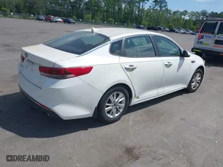 2016 Kia Optima LX with VIN KNAGT4L3XG5095972, listed as a IAAI auction lot 42130422 with 103,420 mi miles. Bid and sale history available at carsss.com. Image 4.