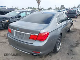 2012 BMW 7 Series 740i with VIN WBAKA4C52CC613676, listed as a IAAI auction lot 42509312 with 113,971 mi miles and . Bid and sale history available at DreamBid. Image 4.
