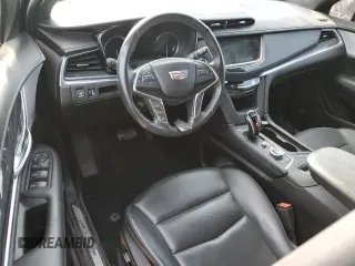 2023 Cadillac XT5 FWD Premium Luxury z VIN 1GYKNCRS0PZ173923, wystawiony jako Copart lot #52212695 z przebiegiem Nie podano mil oraz Szkoda całkowita • Salvage title. Historia ofert i sprzedaży dostępna na DreamBid. Obrazek 8.