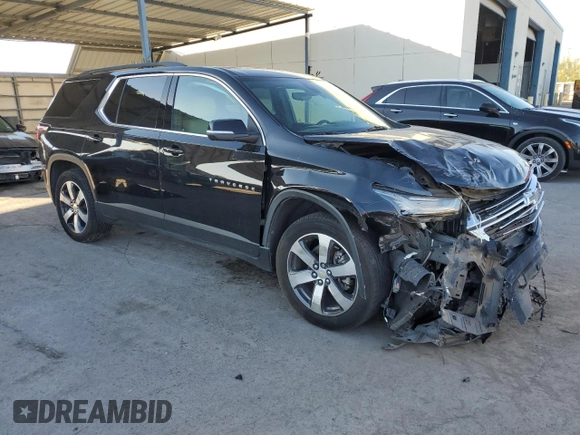 2022 Chevrolet Traverse LT Leather with VIN 1GNERHKW6NJ121880, listed as a Copart auction lot 77475194 with 97,546 mi miles and Salvage Title. Bid and sale history available at carsss.com. Image 4.