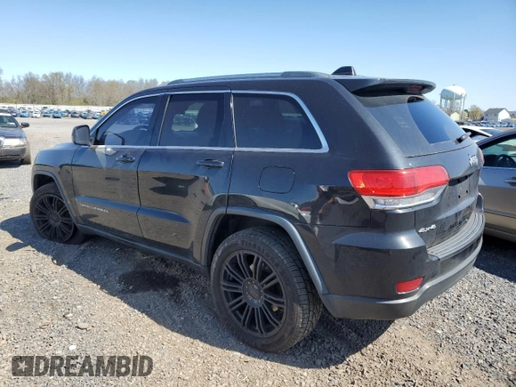 2014 Jeep Grand Cherokee Laredo with VIN 1C4RJFAG4EC210321, listed as a Copart auction lot 53574595 with 119,650 mi miles and Salvage Title. Bid and sale history available at DreamBid. Image 2.